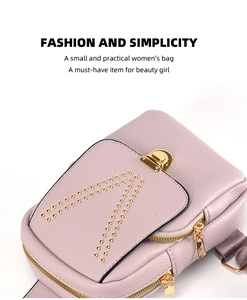 Detailed top view of pink leather chest bag with golden studs and metal hardware