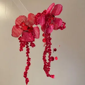 Elegant red fabric flower earrings with sparkling sequins and long silk tassels for women