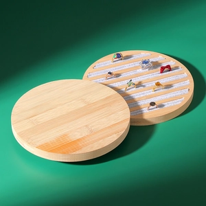 Bamboo wood round jewelry tray with grey velvet ring slots for display and storage