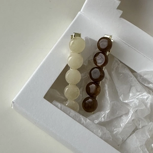 Set of 2 minimalist hair clips with beige and dark brown round resin beads on gold metal