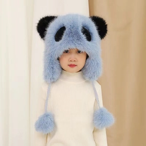 Detail of light blue panda style winter hat with faux fur and pom-pom drawstrings