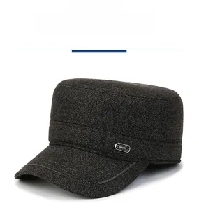 Close-up of thick dark grey wool cadet cap with silver Sport badge and embroidery