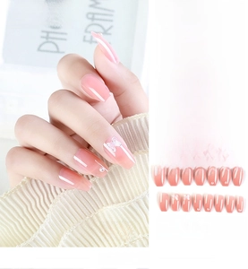Detailed set of 24 press-on nails with butterfly motifs and pearls on pink base