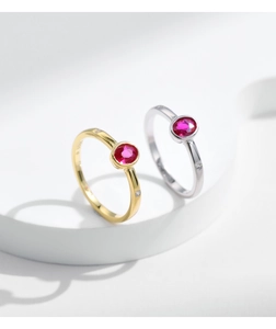 Detail of S925 sterling silver ring featuring red opal and white zircon micro-inlay