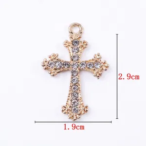 KC gold plated cross pendant with white rhinestones, size 2.9cm by 1.9cm and lightweight