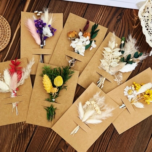 Handmade kraft greeting cards decorated with various preserved dried flower bouquets