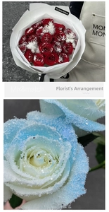 Dettaglio di rose rosse artificiali con trama di neve e rosa di cristallo blu