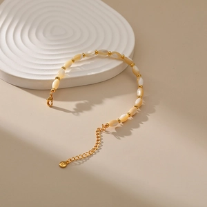 Elegant irregular shell pearl bracelet with 18K gold plated chain and lobster clasp