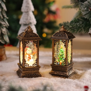 Detail of vintage bronze Christmas lanterns with snowmen and LED sparkling snow effect