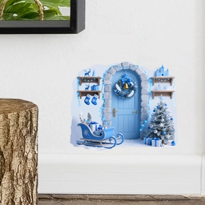 Detail view of 3D Christmas wall sticker featuring a blue door and snowy winter scene