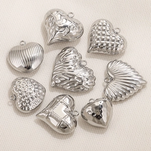 Polished stainless steel 3D hollow heart pendants in eight assorted textured designs