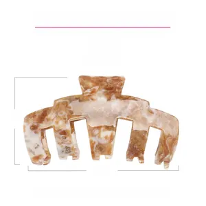 Detailed view of large marble acetate hair claw clip with dimensions and 27.8g weight