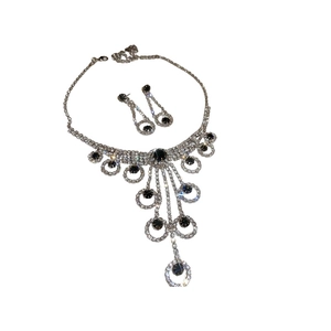Luxury rhinestone circle tassel jewelry set with necklace and matching earrings
