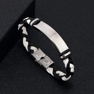 Macro view of braided black leather strap with polished stainless steel clasp for men