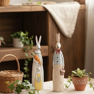 Vintage wood-look resin rabbit ornaments featuring a parent-child pair and carrot bunny