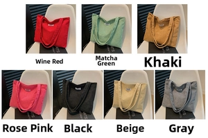 Close-up of corduroy tote bags in seven colors featuring a vintage striped texture