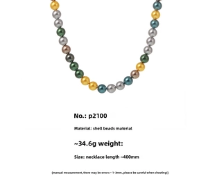 Detail showing 400mm shell pearl necklace with multi-color beads in gold and green