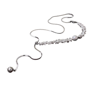 Modern baroque pearl necklace with silver irregular beads and sleek snake chain