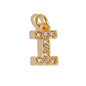 Detailed view of gold plated letter I pendant with sparkling cubic zirconia inlay
