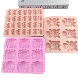 Silicone mold set featuring crab turtle footprints and floral shapes for baking and crafts