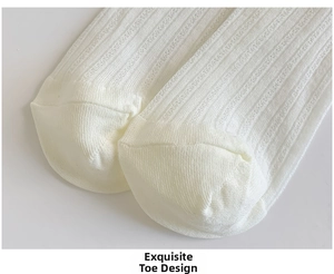 Detailed macro view showing the seamless toe stitching of white ribbed cotton socks