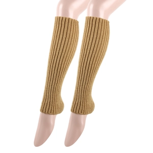 Detail of beige ribbed knit leg warmers showing the vertical texture and elastic fit