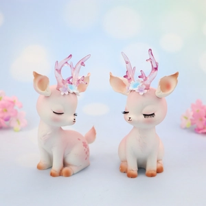 Cute pink and white deer resin car interior ornaments with purple antlers and flower details