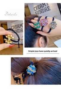 Detail of crystal flower hair tie showing back structure and high elasticity rubber band