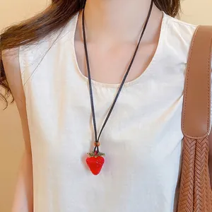 Realistic red strawberry resin pendant necklace with dark brown leather cord for women