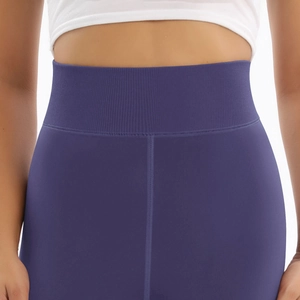 Detail of high waist ribbed waistband on thick purple fleece thermal leggings for women