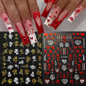 Detail of Valentines Day nail stickers with red hearts and gold rose patterns
