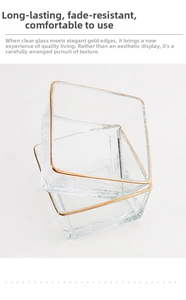 Detail of square glass fruit bowls with elegant gold rim finish and stackable design