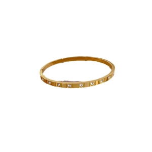 Minimalist gold-plated stainless steel bangle with pavé-set round white cubic zirconia