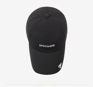 Detail of black breathable mesh baseball cap with white logo and side cooling vents