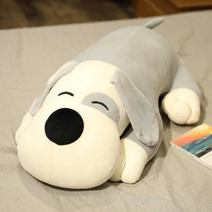 Detail of soft plush dog pillow shell featuring grey spots and a large black nose