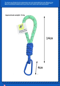 Detail view of 14cm bicolor woven climbing rope keychain with blue metal D-ring carabiner