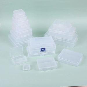 Multiple sizes of clear plastic organizer boxes with snap lids for jewelry storage