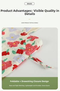Close-up of foldable floral canvas bag featuring drawstring closure and reinforced stitching