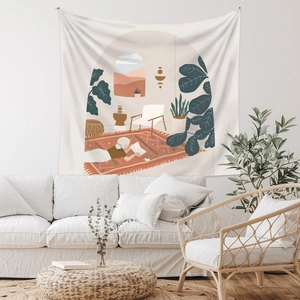 Detail of bohemian wall tapestry featuring a woman reading with monstera leaf plants