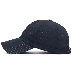 Breathable navy blue mesh baseball cap with laser-cut holes and adjustable elastic strap
