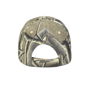 Detail of camouflaged baseball cap with adjustable velcro strap and thick twill fabric