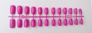 Close-up of 24 pieces long square press-on nails in vibrant magenta pink finish