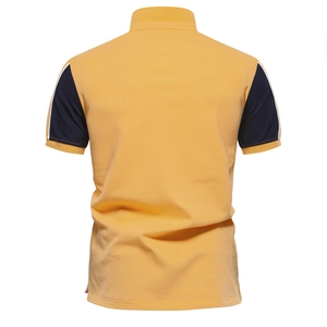 Back view of a yellow men's polo shirt with navy blue sleeves and white stripe details