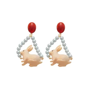 Boucles d'oreilles lapin en argent avec chaîne de perles bleues et perle rouge rétro