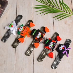 Sequin Halloween slap bracelets for kids featuring pumpkin, ghost, and bat festive designs