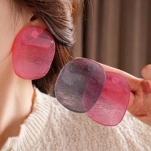 Fashionable oval resin drop earrings with radiant brushed texture in pink and purple colors