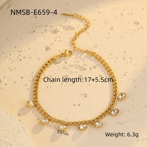 Detailed view of a gold chain bracelet with round clear zircon charms and dimensions