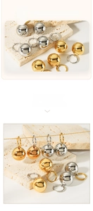 Detail of 18K gold plated hollow ball earrings with 360-degree manual mirror polishing