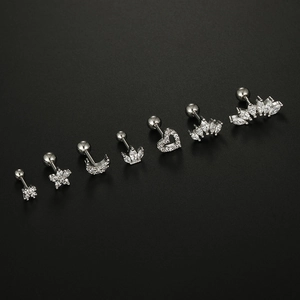 Set of 7 silver stainless steel ear studs with zircon heart, flower, and moon designs