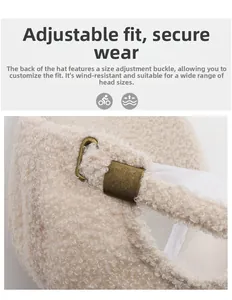 Detail of adjustable metal buckle on cream faux fur baseball cap with plush texture